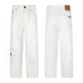 Off white denim with tonal embroidered cross patches
