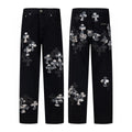 Black denim with silver cross patches and gothic script