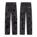 Washed black denim with tonal black cross patches