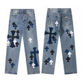 Light wash denim with navy, black and white cross patches