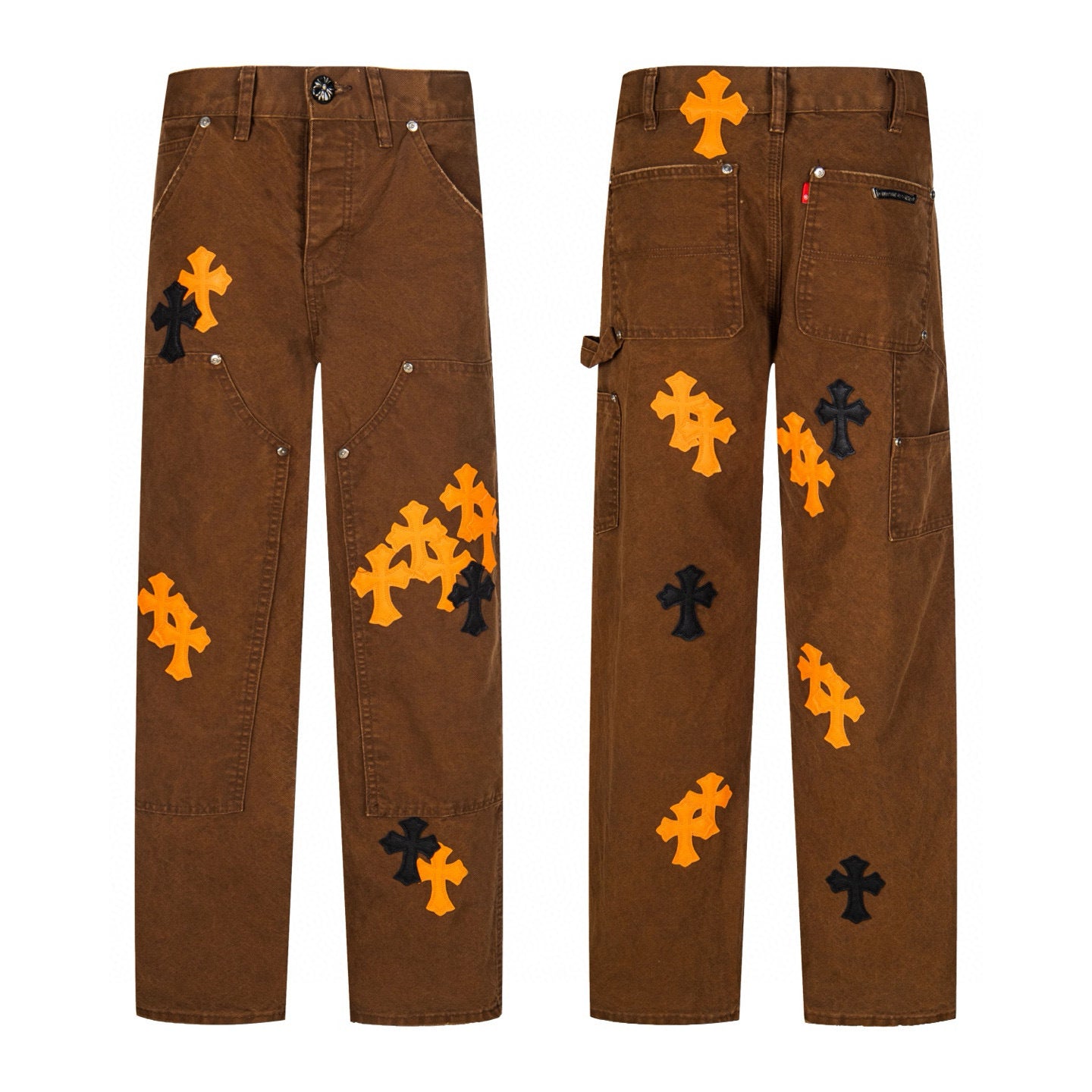 Brown carpenter pants with orange and black cross patches