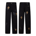 Black carpenter pants with black and leopard cross patches