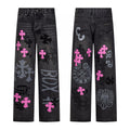 Charcoal washed denim with pink cross patches and printed graphics
