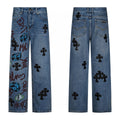 Blue denim with script artwork and black cross patches