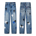 Blue and white cross patch jeans in mid wash