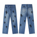 Black cross patch jeans in stone blue