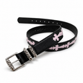 Slim black belt with pink crosses and filigree roller buckle