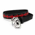 Black belt with red crosses and sculpted silver buckle
